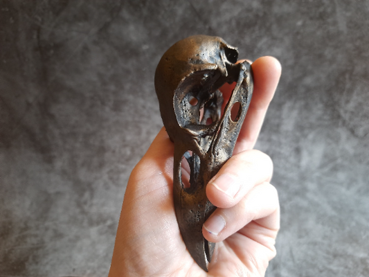 Raven skull replica gold bronze painting